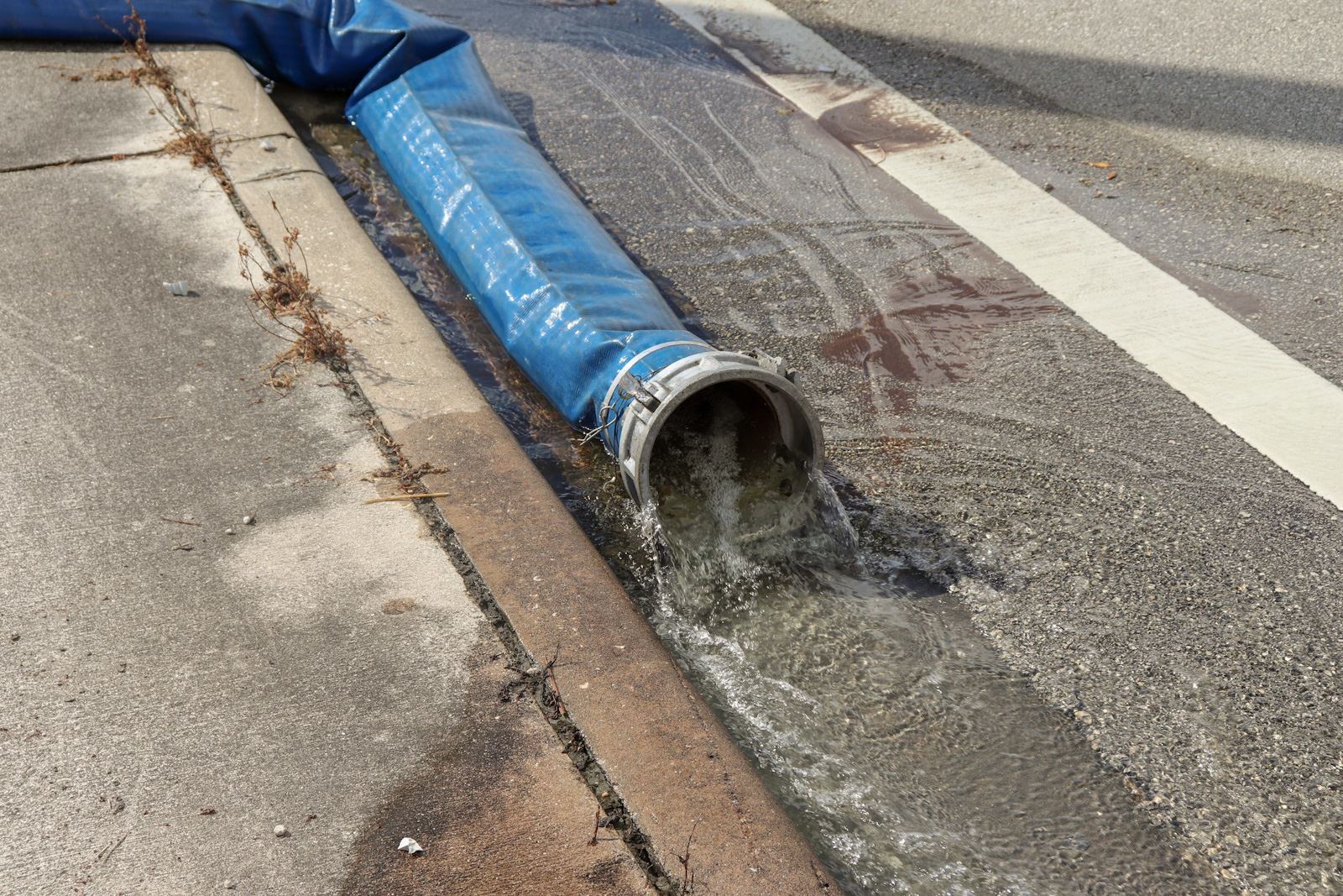 Earman pump station hose draining into Alt A1A gutter