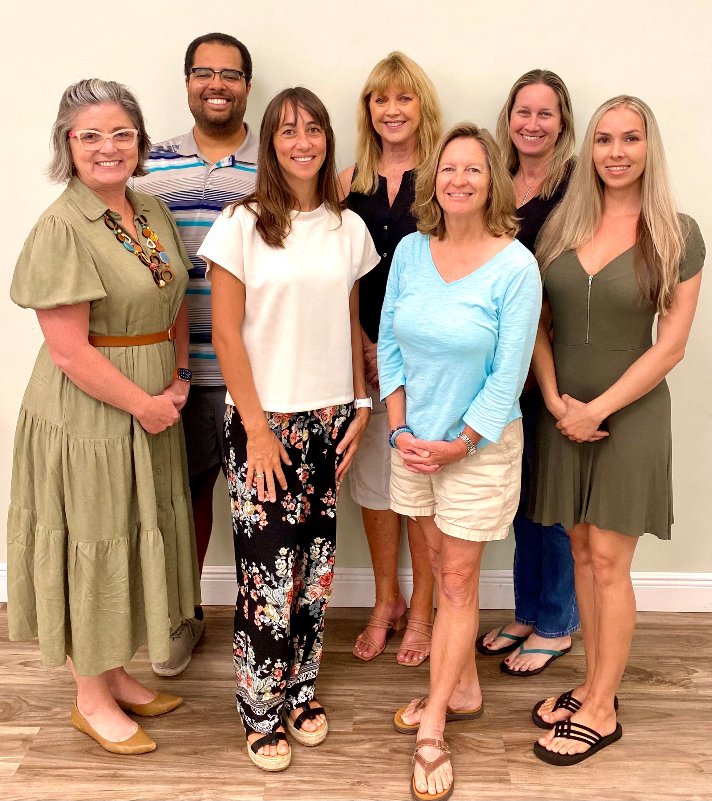 Seven Environmental Committee members standing together for a group photo
