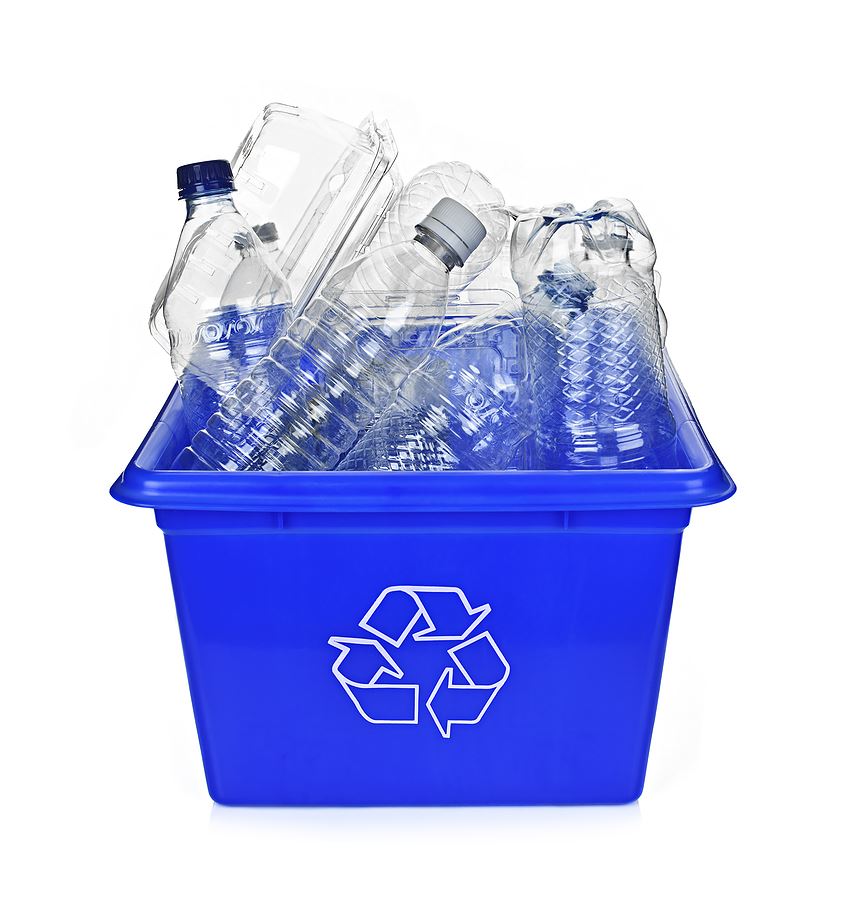 Blue recycling bin with plastic bottles inside